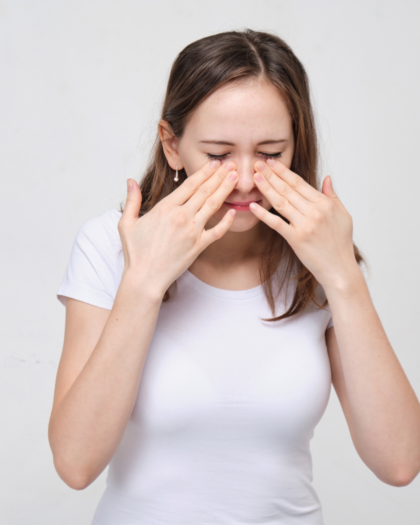 πυογόνο κοκκίωμα woman in pain in nose